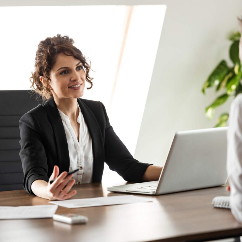 smiling-consultant-talking-to-a-client-on-a-business-meeting-portrait-.jpg smiling-consultant-talking-to-a-client-on-a-business-meeting-portrait-.jpg